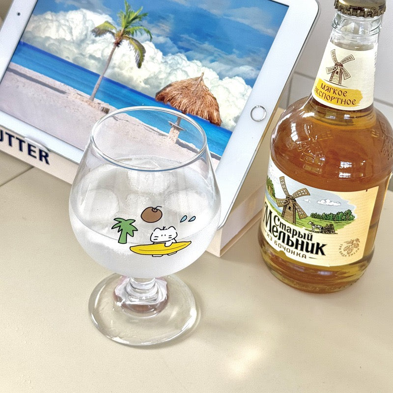 Surfing cat footed glass cups showing blue and yellow surfboard designs, 300ML