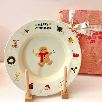 Christmas gingerbread man round plate with MERRY CHRISTMAS text and festive icons, 9 inches
