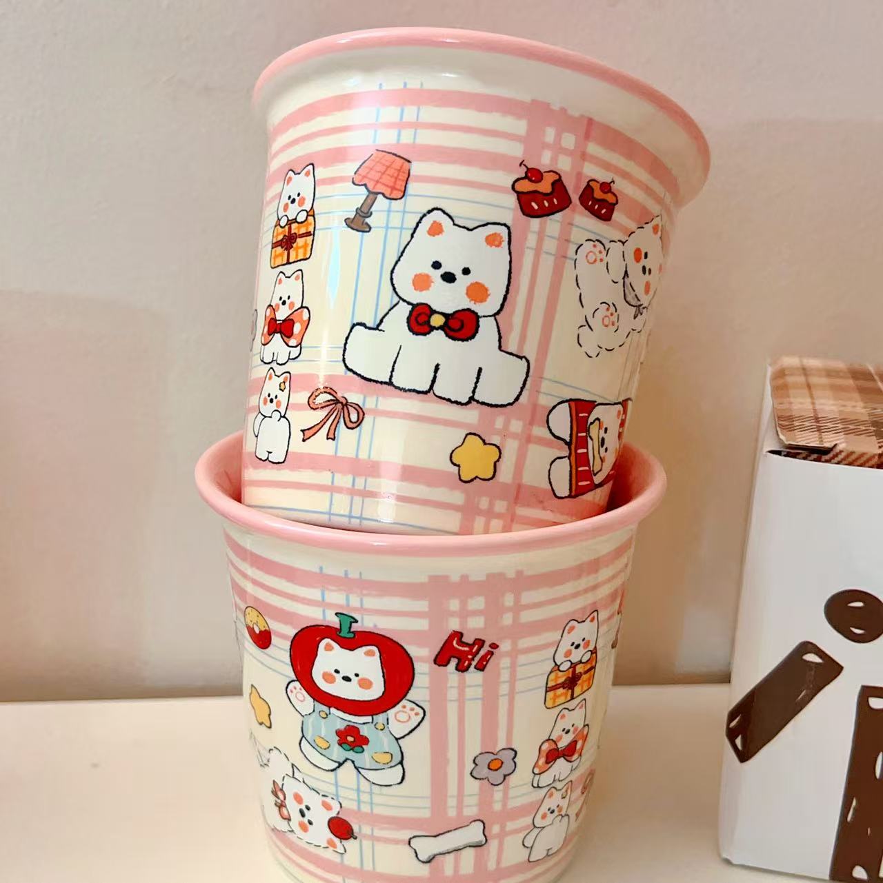 Cute Westie dog ceramic mug with pink plaid background and multiple dog illustrations, 330ML