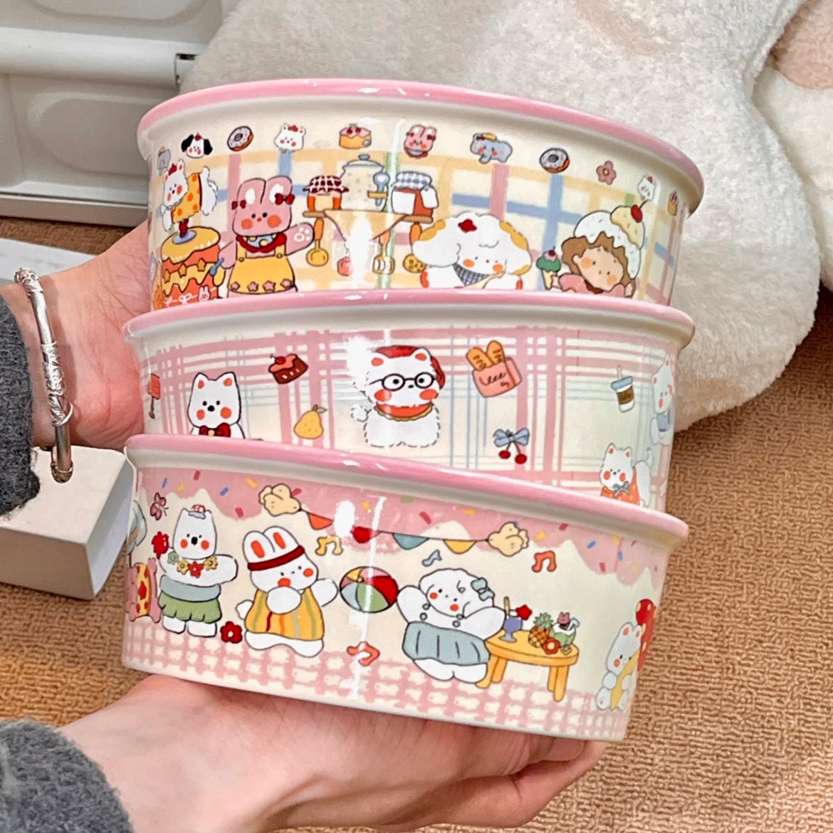 Pink ceramic salad bowls stacked showing Westie café, panda picnic, and piggy bakery designs, 600ML
