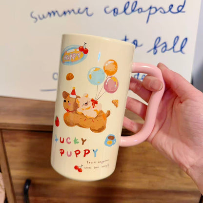 Mug with cartoon dogs and 'Lucky Puppy' text held by a hand on a wooden surface.