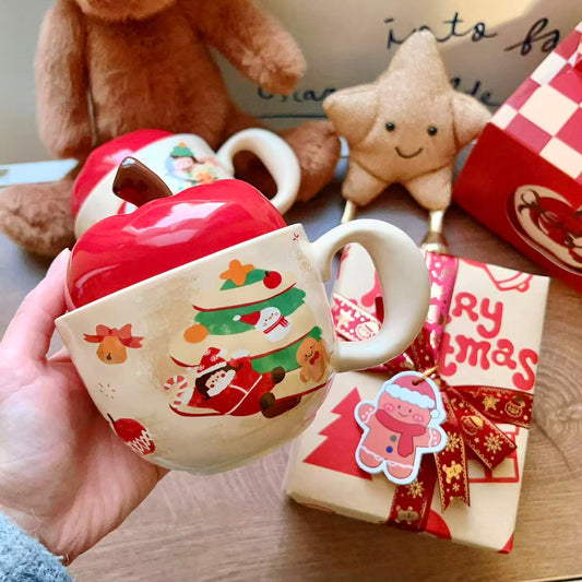 Christmas ceramic mugs with red apple lid showing gingerbread man and girl playing piano designs, 420ML