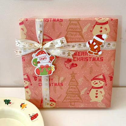 Christmas gingerbread man round plate with MERRY CHRISTMAS text and festive icons, 9 inches