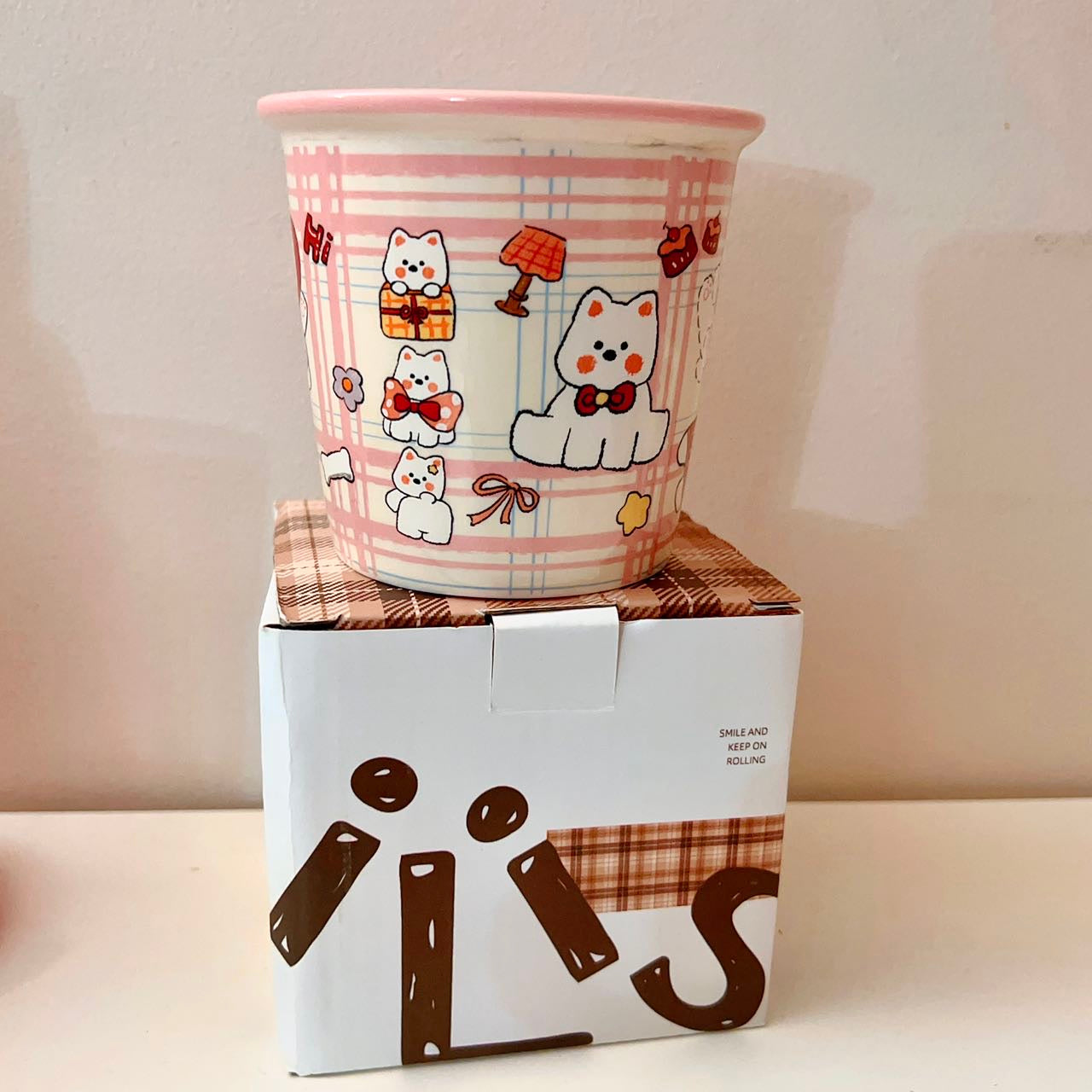 Cute Westie dog ceramic mug with pink plaid background and multiple dog illustrations, 330ML