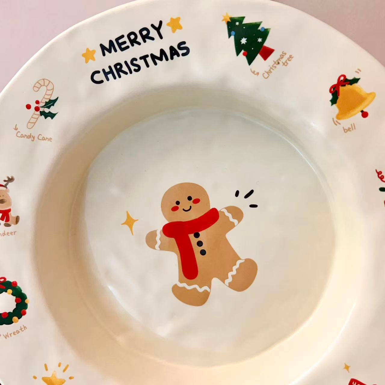 Christmas gingerbread man round plate with MERRY CHRISTMAS text and festive icons, 9 inches