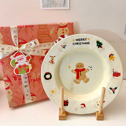 Christmas gingerbread man round plate with MERRY CHRISTMAS text and festive icons, 9 inches