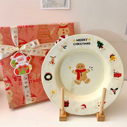 Christmas gingerbread man round plate with MERRY CHRISTMAS text and festive icons, 9 inches