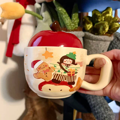 Christmas ceramic mugs with red apple lid showing gingerbread man and girl playing piano designs, 420ML