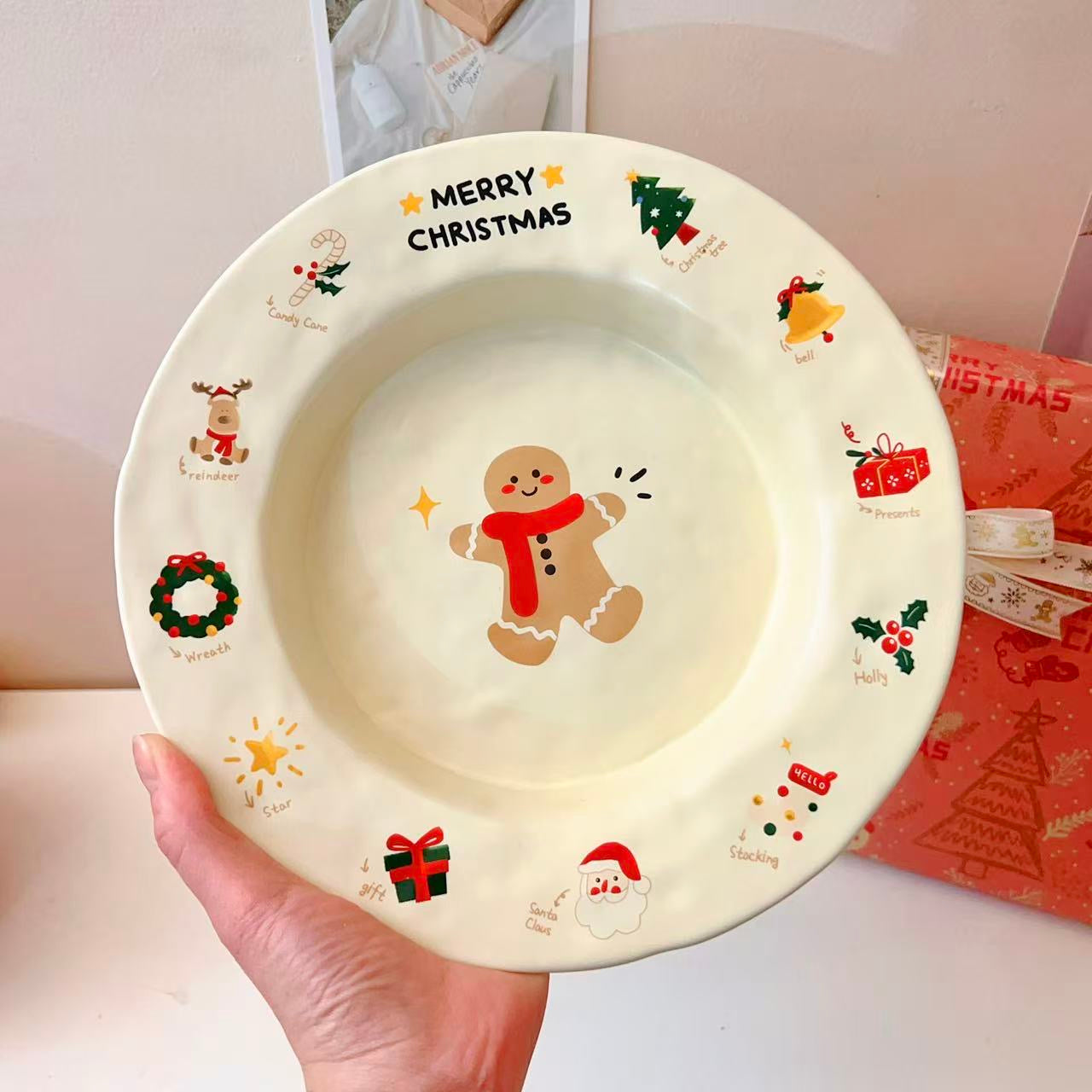Christmas gingerbread man round plate with MERRY CHRISTMAS text and festive icons, 9 inches