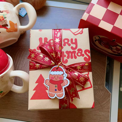 Christmas ceramic mugs with red apple lid showing gingerbread man and girl playing piano designs, 420ML